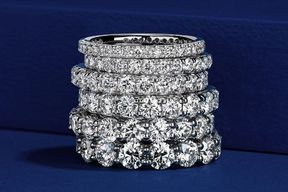A stack of diamond eternity bands A stack of diamond eternity bands