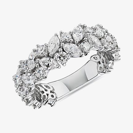 Cluster ring in 14k white gold wedding ring style featuring diamonds of mixed shapes and sizes