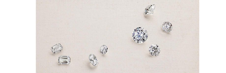 Different diamond colors shown on a gray background. Different diamond colors shown on a gray background.